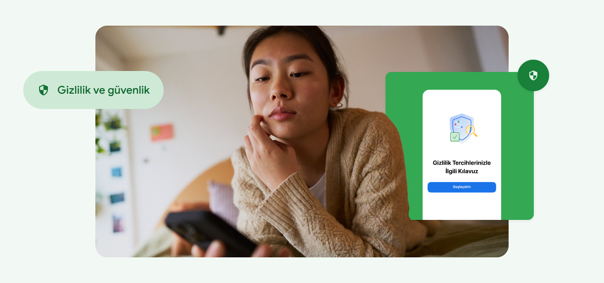 Bir kadın yüzüne dokunarak telefonuna bakıyor.